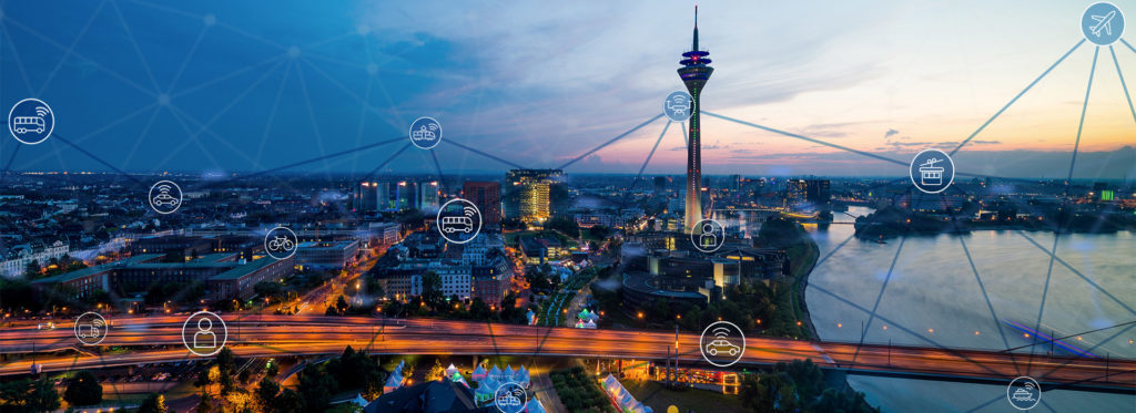 Skyline von Düsseldorf bei Nacht mit einem Netzt aus Verbindungen